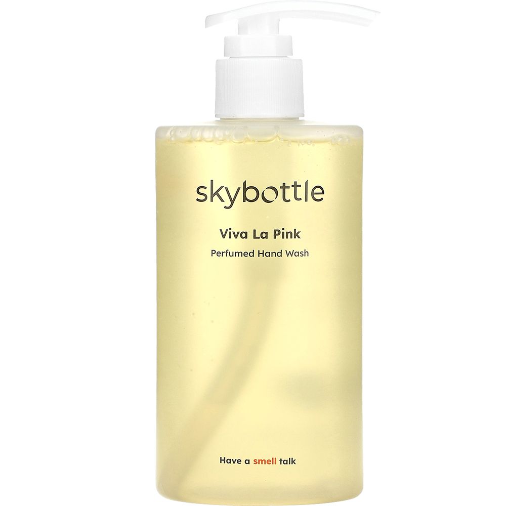 Vloeibare zeep met dispenser. Opschrift: skybottle, Viva La Pink, Perfumed Hand Wash. Transparante fles met gelige vloeistof.