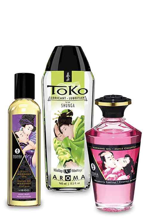 Trois produits Shunga : lubrifiant, huile de massage et huile chauffante en flacons.