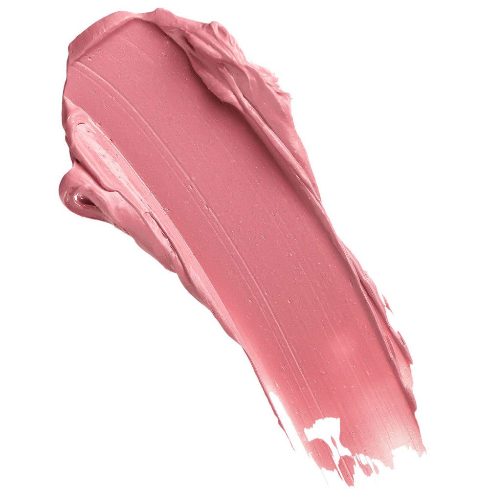 Échantillon de gloss rose sur fond blanc. Texture visible.