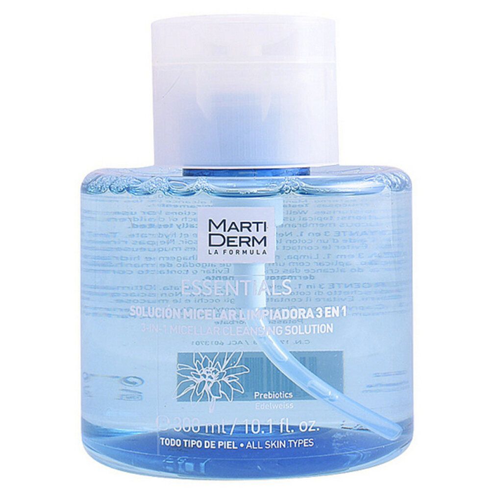 Blauwe transparante fles met witte dop. Opschrift: Marti Derm Essentials, Solución Micelar 3 en 1. Met pomp.