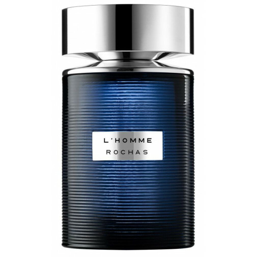 Flacon L'Homme Rochas Eau de Toilette avec bouchon argenté et verre bleu côtelé.