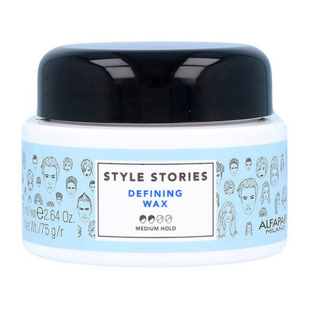 Witte pot met zwarte deksel. Opschrift: Style Stories Defining Wax. Gezichtscontouren op het etiket. Alfaparf Milano.