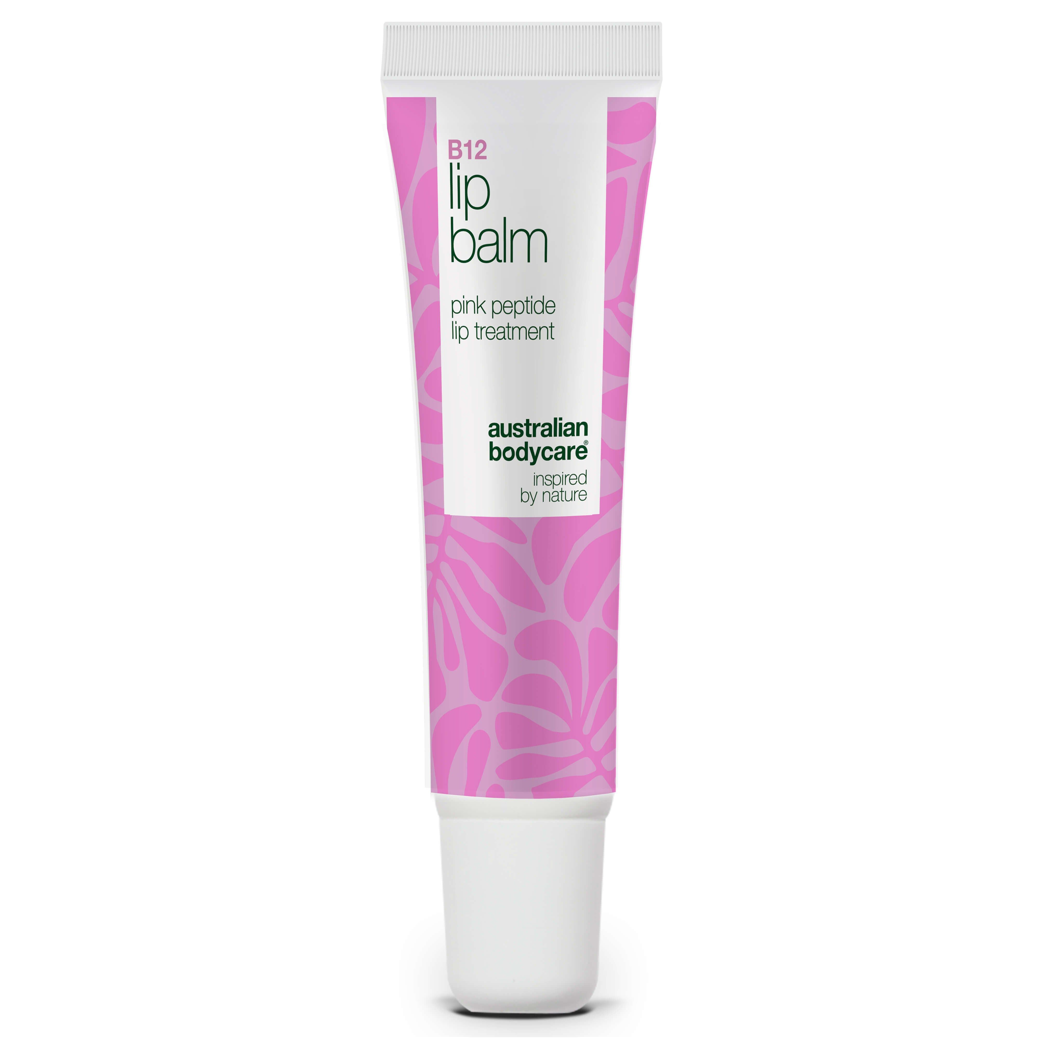 Tube de baume à lèvres B12. Design blanc et rose, texte 'B12 Lip Balm'. Marque : Australian Bodycare.