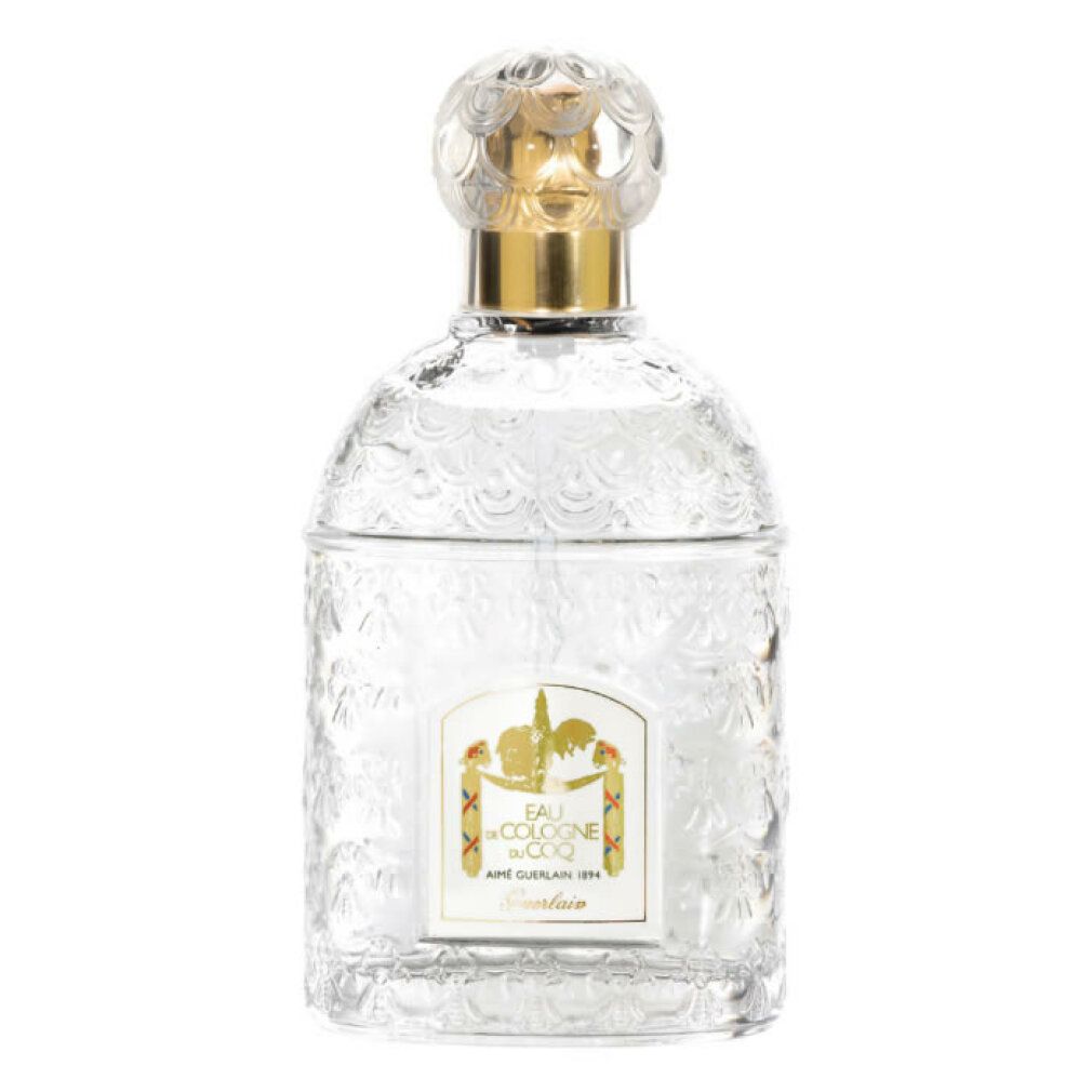Flacon transparent avec bouchon doré. Étiquette avec texte et logo. Verre gaufré. Eau de Cologne du Coq.