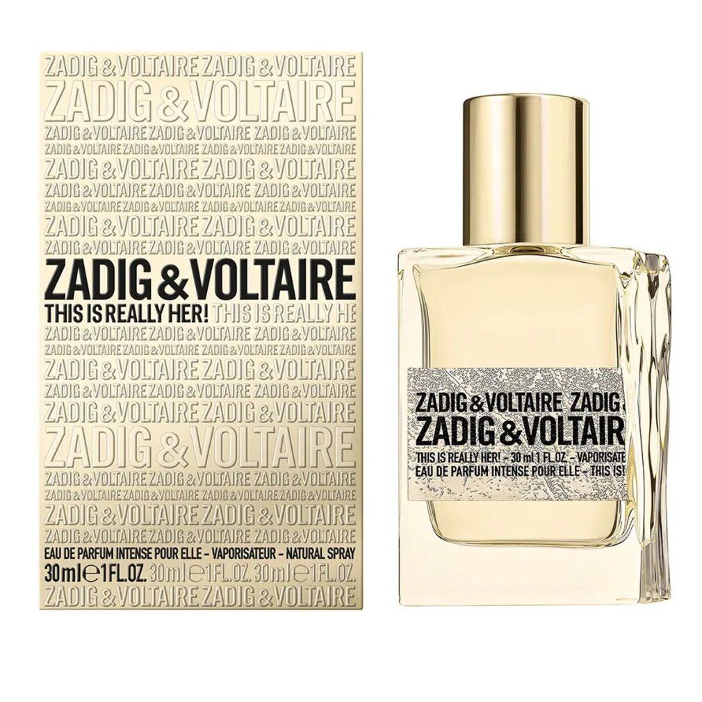 Flacon et boîte de parfum. Inscription : ZADIG & VOLTAIRE THIS IS REALLY HER. Bouchon doré, flacon rectangulaire.