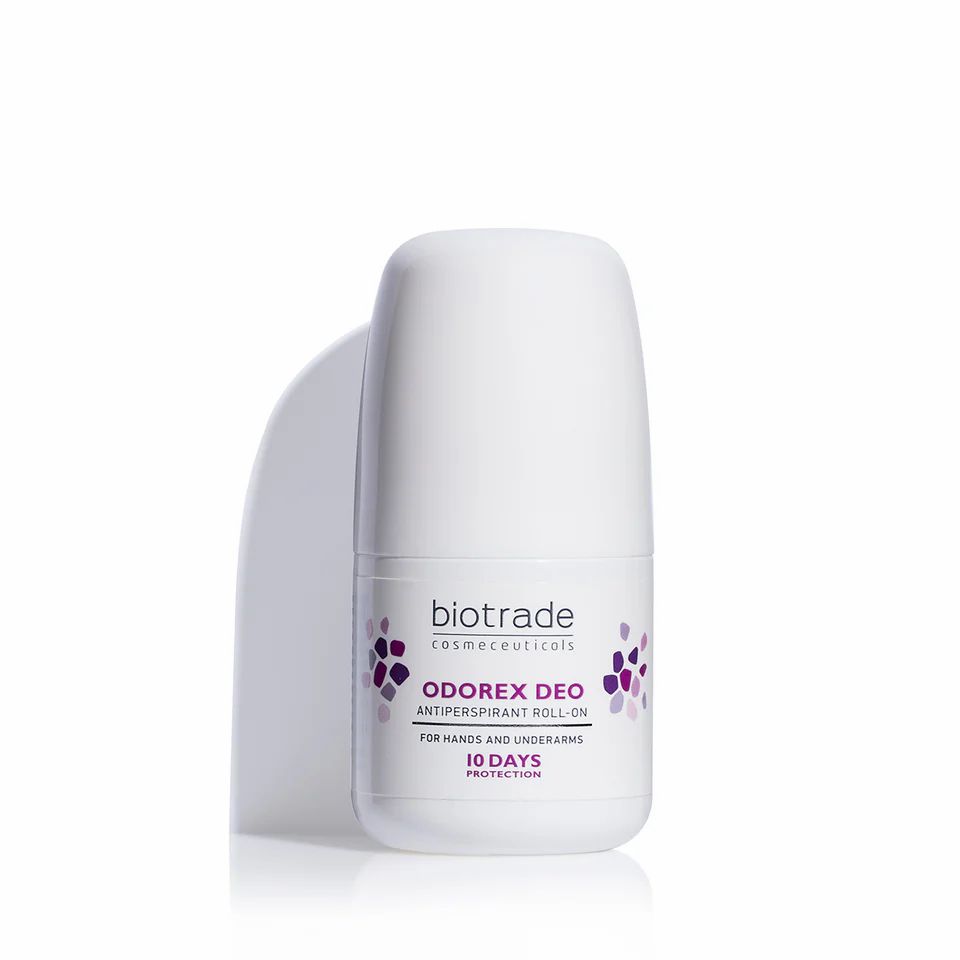 Roll-on blanc avec accents violets. Inscription: Biotrade, Odorex Deo, antitranspirant roll-on. Pour mains et aisselles. Protection 10 jours.
