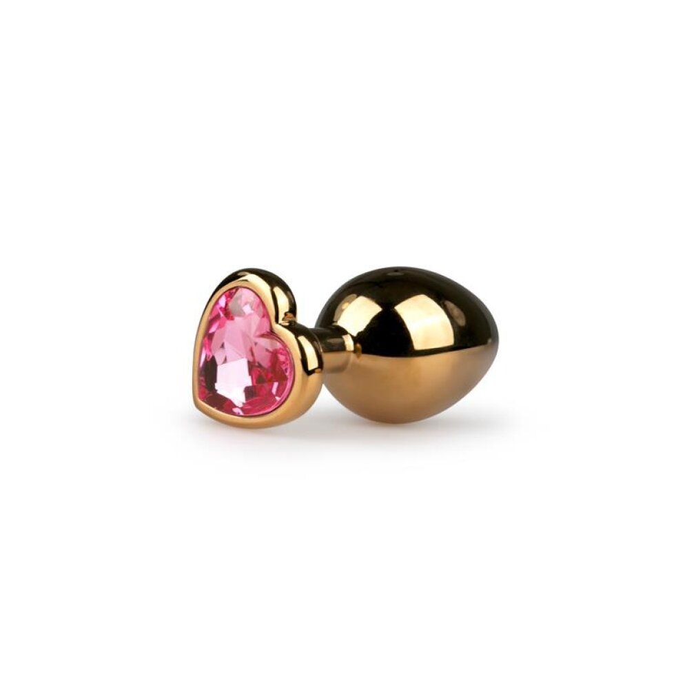 Gouden anale plug met roze hartvormige siersteen.