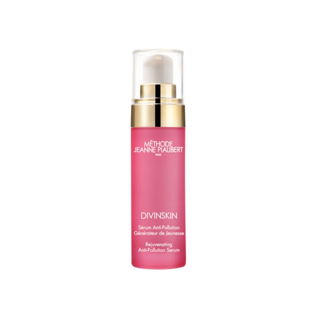 Jeanne-Piaubert Divinskin Serum: roze fles met pompdos en gouden ring.
