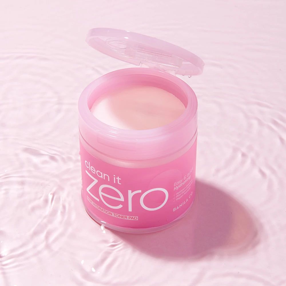 Een roze pot met deksel, gevuld met pads. Opschrift "Clean it Zero".