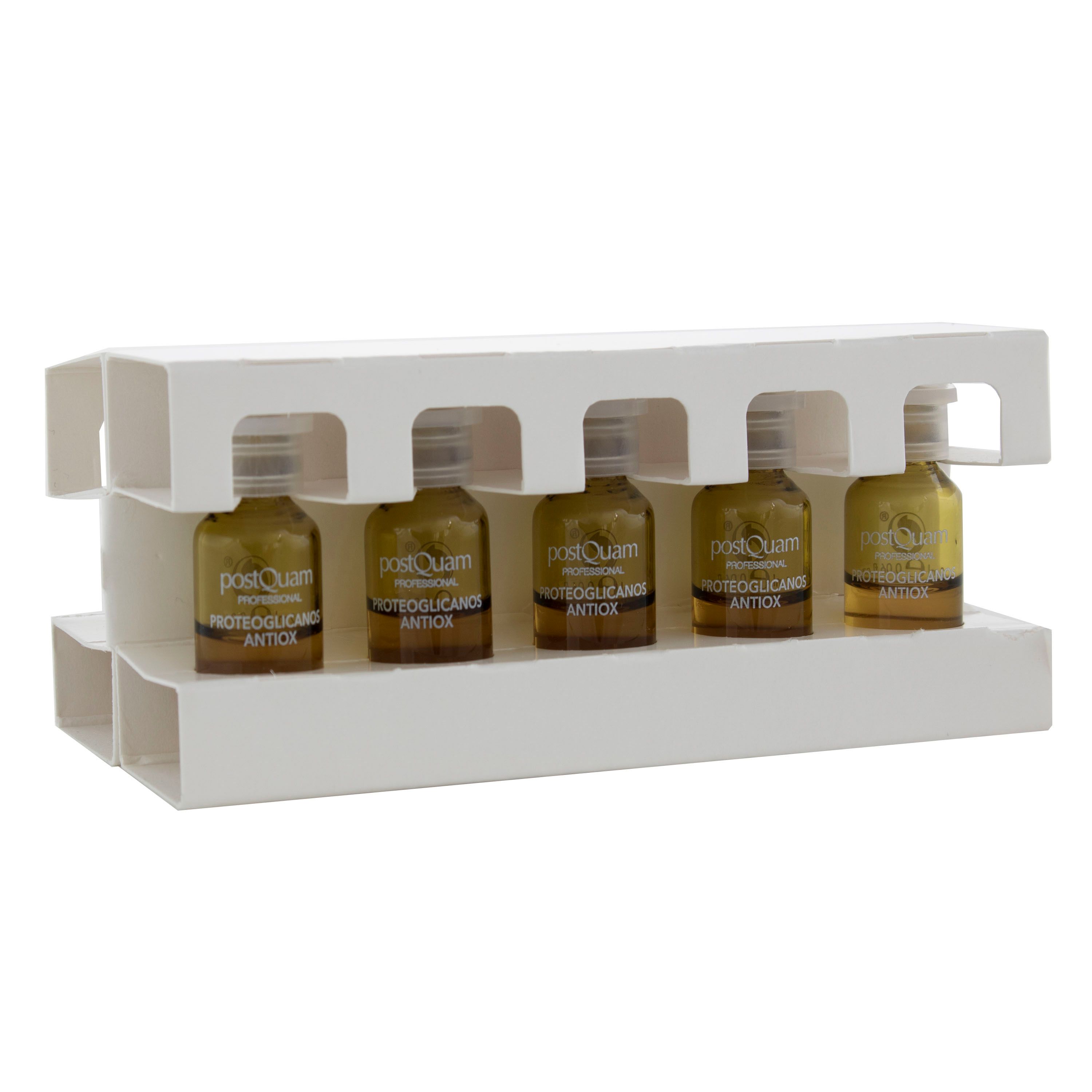 Cinq ampoules Postquam Proteoglykane Antioxidant dans un support blanc. Ampoules disposées en rangée.