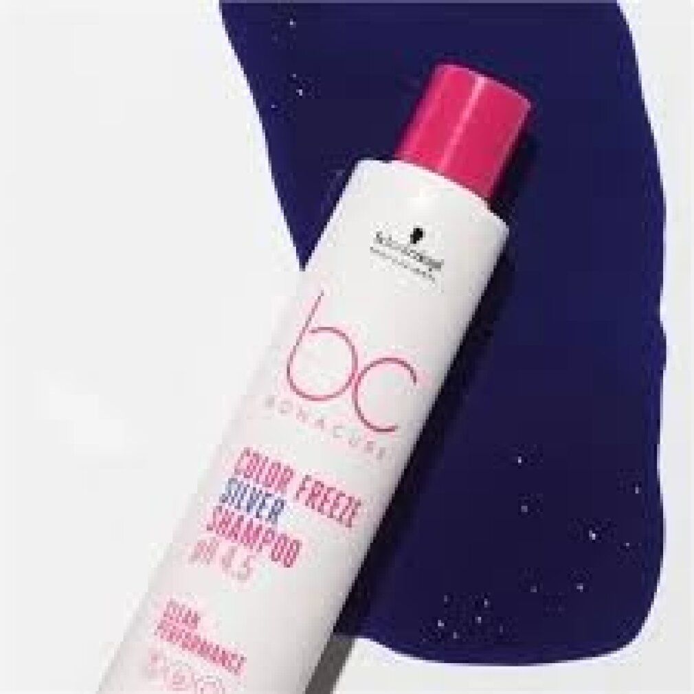 Wit shampoo met roze dop en paarse vloeistof. Opschrift: Schwarzkopf, BC Bonacure Color Freeze Silver Shampoo pH 4.5.