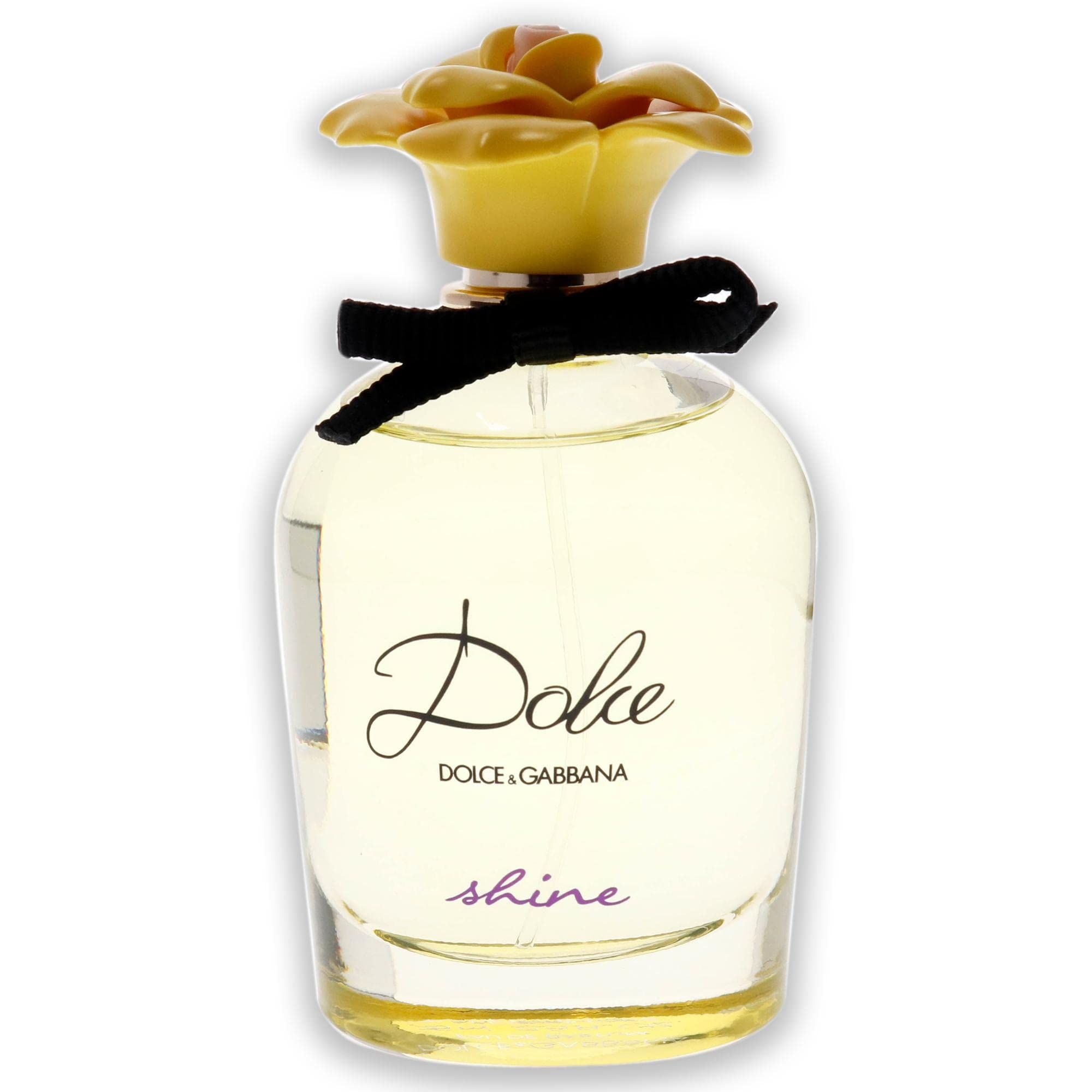 Flacon de parfum avec bouchon fleur jaune et ruban noir. Inscription "Dolce & Gabbana Dolce shine".