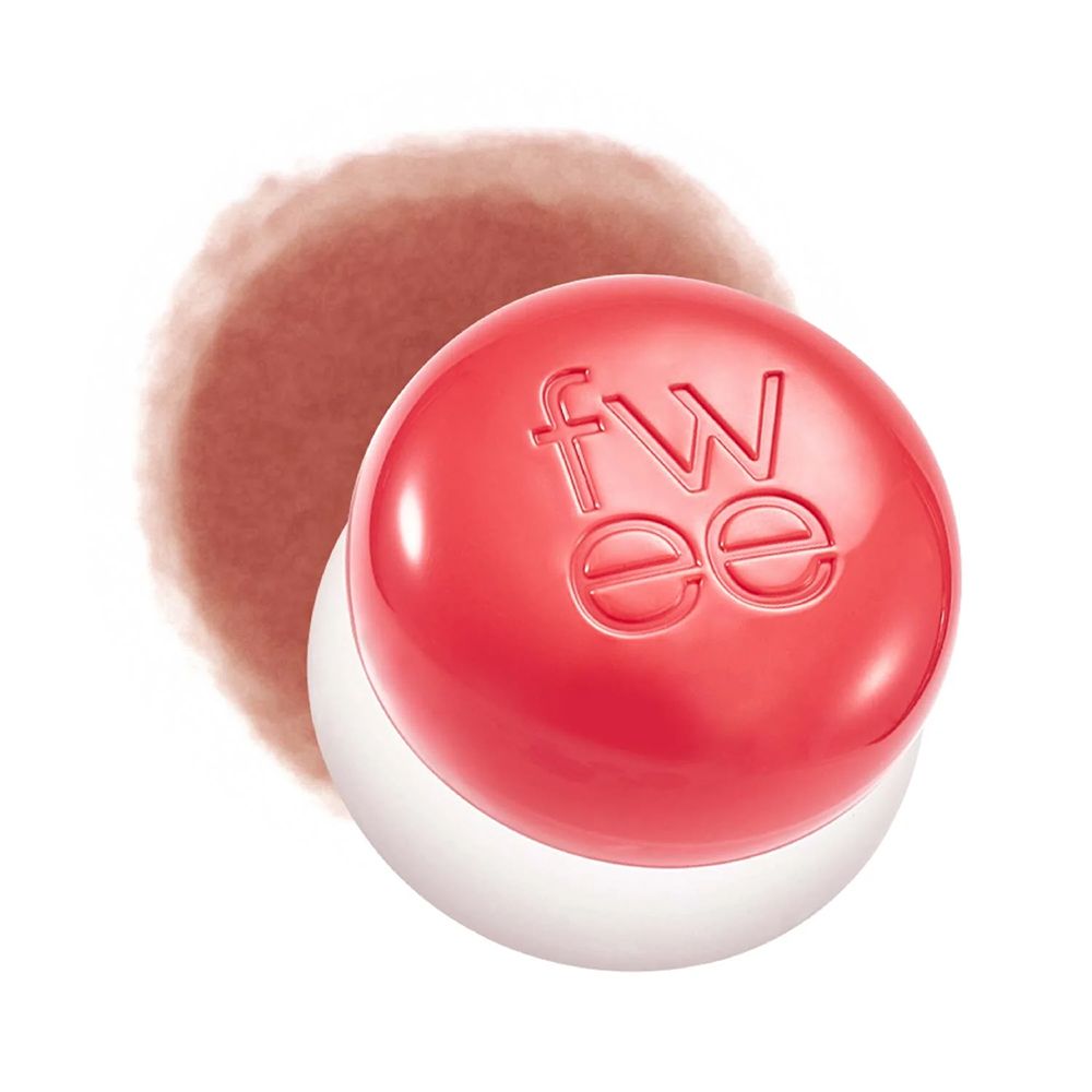 Rode poederpot met Fwee-logo en zachte applicator ernaast.
