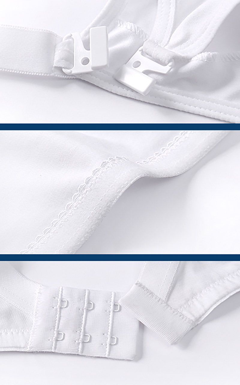Close-ups van een witte voedings-bh. Clipsluiting, naaddetails, haaksluiting.