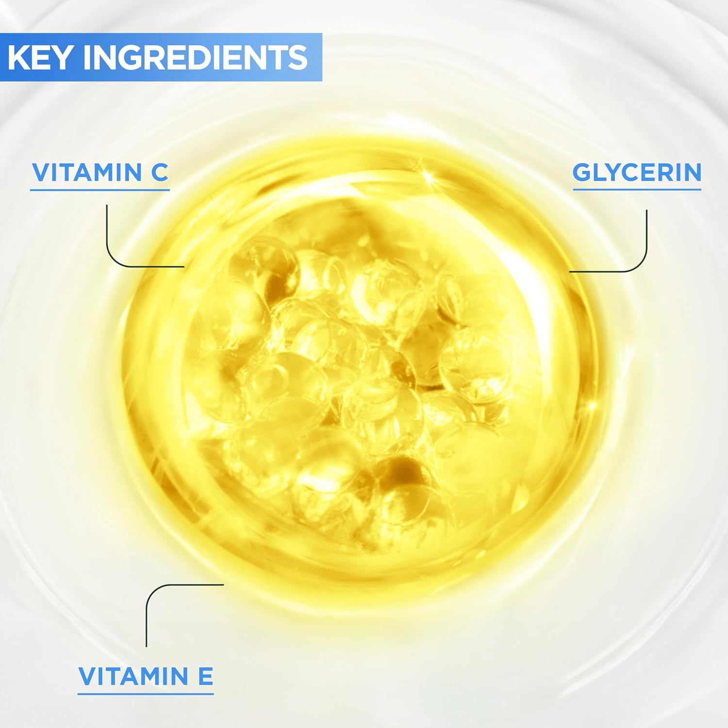 Gros plan sur des liquides jaunes avec les textes Vitamine C, Glycérine et Vitamine E. Fond blanc.