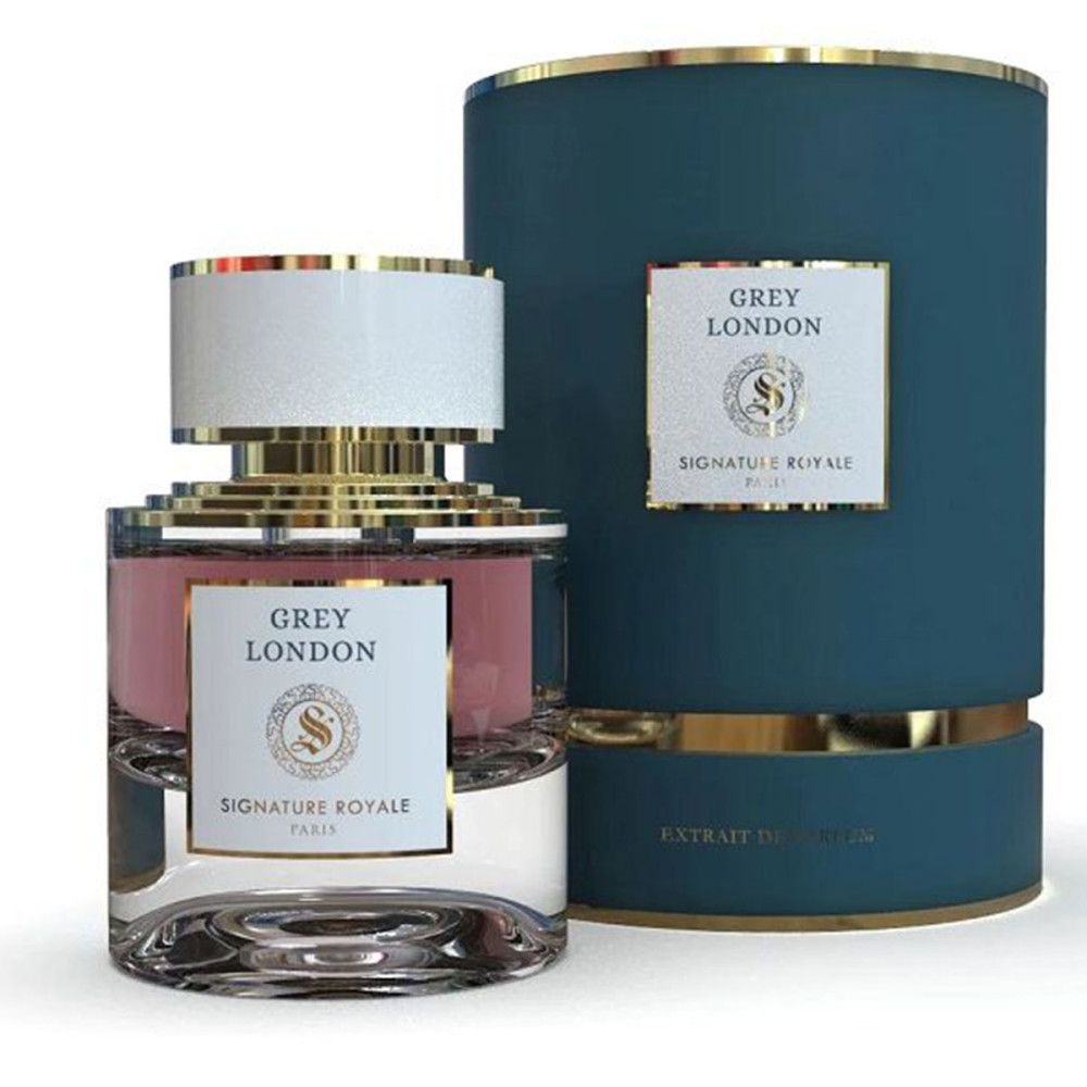 Flacon de parfum et emballage bleu. Flacon avec bouchon blanc, éléments dorés et étiquette. Emballage avec bordures dorées.