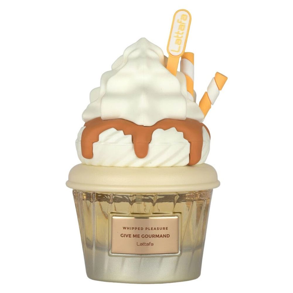 Parfumfles in cupcake-vorm. Met slagroomdecoratie en wafelstokjes. Opschrift: Whipped Pleasure Give Me Gourmand Lattafa.