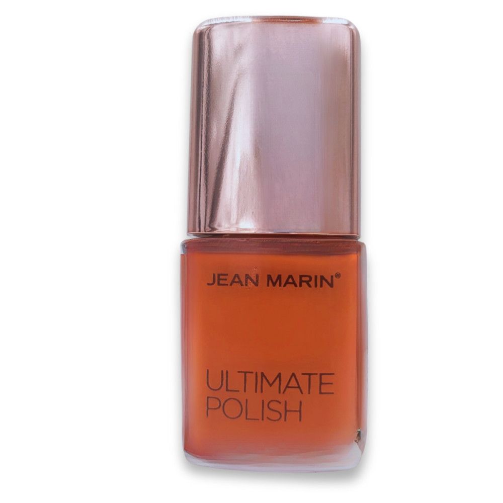 Flacon de vernis à ongles. Jean Marin Ultimate Polish. Vernis orange dans un flacon en verre, bouchon or rose.