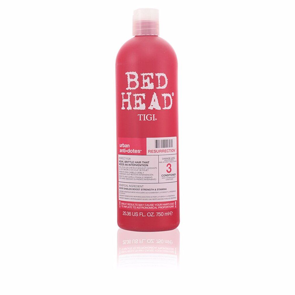 Flacon rouge avec bouchon blanc. Inscription: BED HEAD TIGI. Nom du produit: Resurrection. Texte sur l'étiquette.