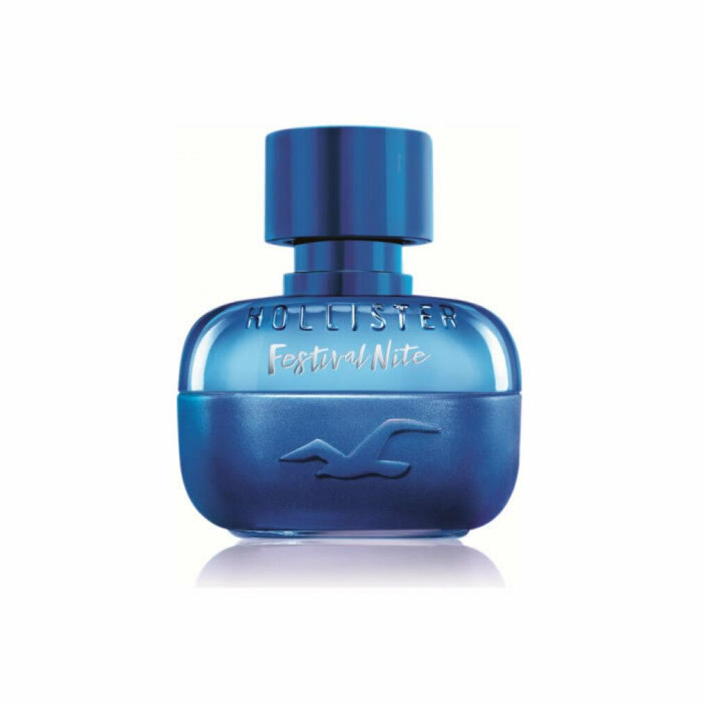 Flacon de parfum bleu. Le flacon indique "Hollister Festival Nite". Le flacon est de forme ronde et a un bouchon bleu.