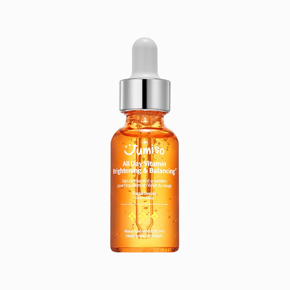 Oranje serumfles met pipet. Opschrift: 'JUMISO All Day Vitamin Brightening & Balancing'.