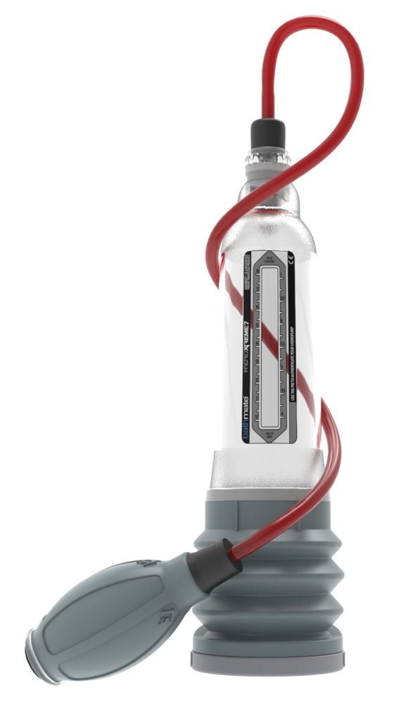 Système hydraulique avec cylindre transparent, soufflet gris et raccord de tuyau rouge. Pompe grise.