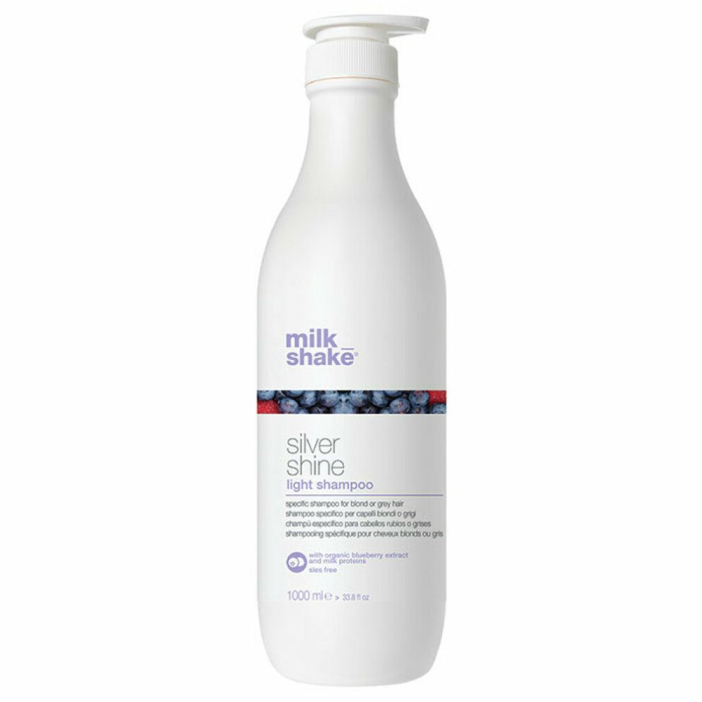 Flacon de shampooing blanc avec pompe. Inscription: milk_shake, Silver Shine light shampoo. 1000 ml.