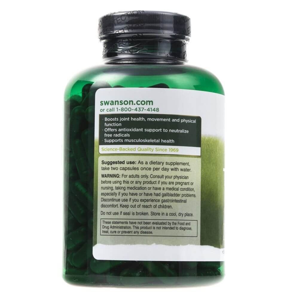 Achterkant van een groene fles met Swanson kurkuma capsules. Bevat dosering en waarschuwingen.