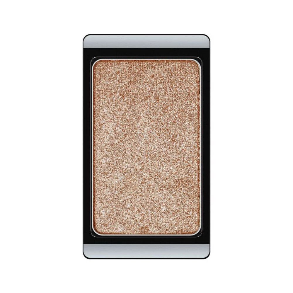 Fard à paupières unique de forme rectangulaire. Reflets dorés. Cadre noir et argent.