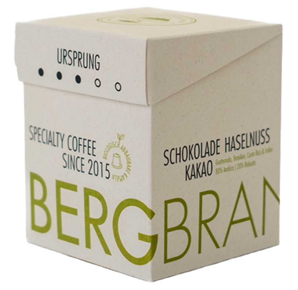 Koffieverpakking. BERGBRAND Specialty Coffee. Chocolade Hazelnoot Cacao. Ursprung, sinds 2015.