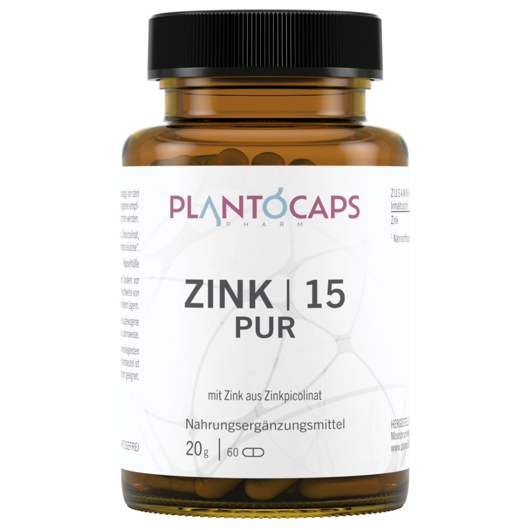 Flacon en verre brun avec couvercle noir. Inscription: plantoCAPS ZINK | 15 PUR. Contient 60 capsules. Complément alimentaire.
