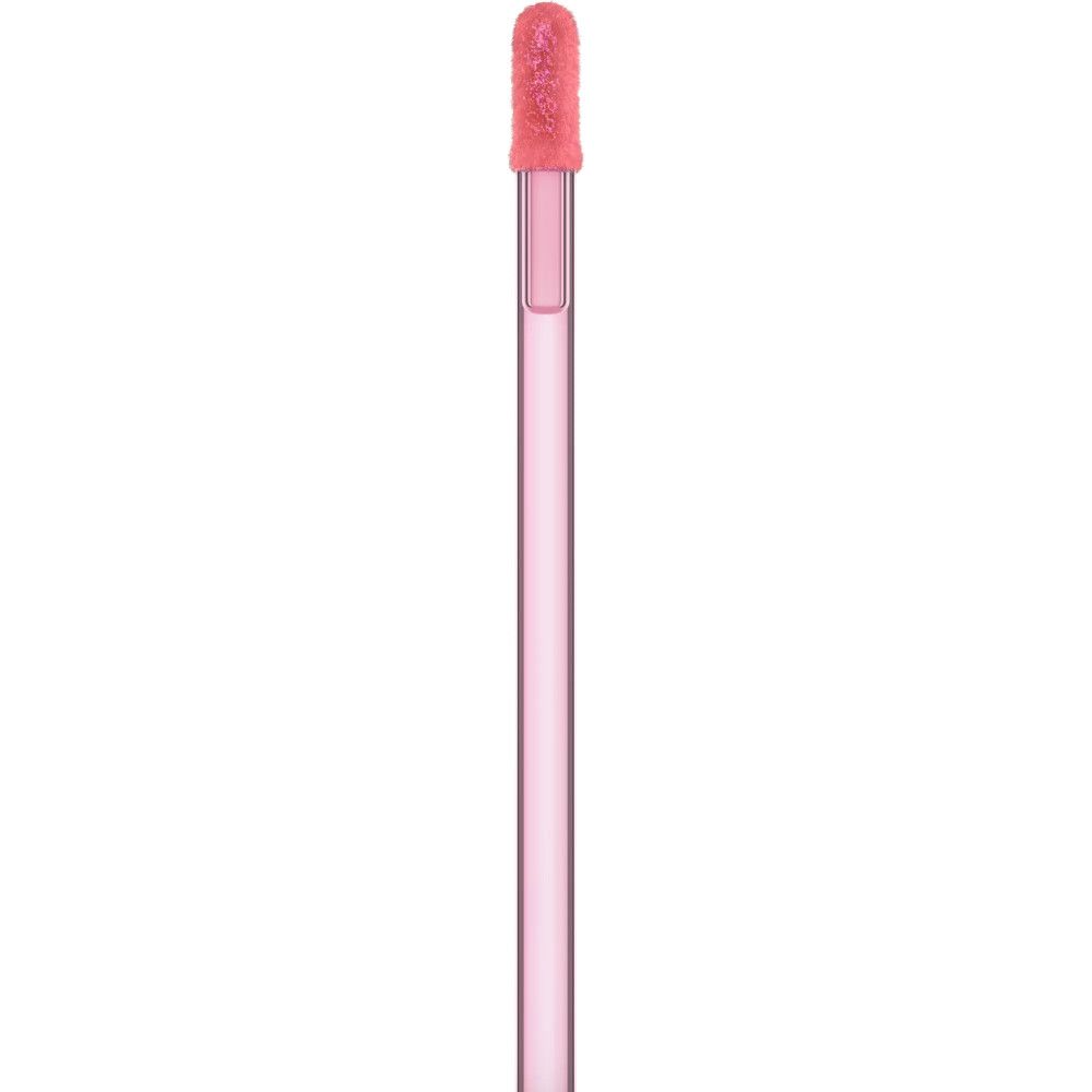Applicateur rose pour fard à paupières liquide. L'applicateur a une forme allongée et une pointe rose.