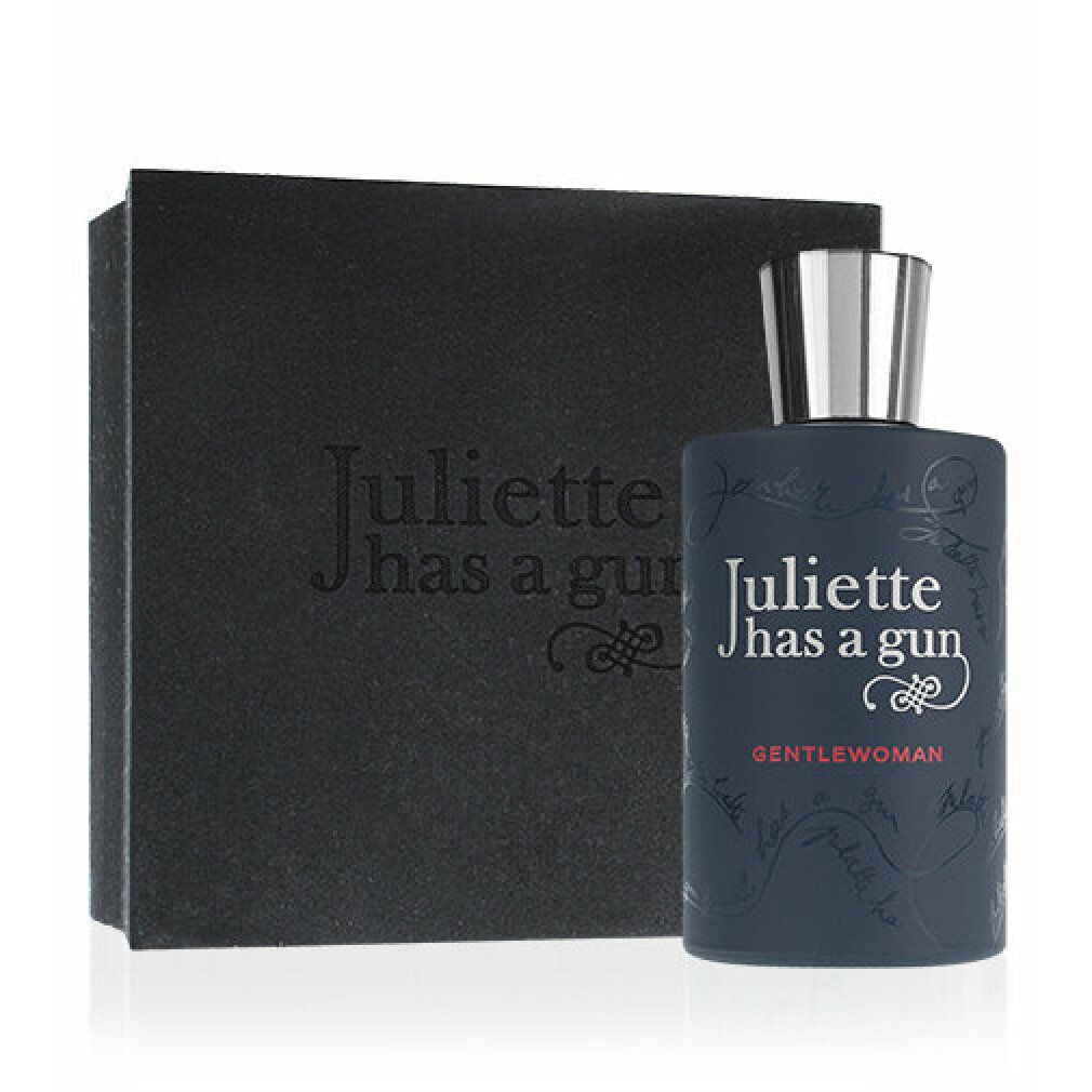 Donkerblauwe fles en zwarte doos. Opschrift: Juliette has a gun, Gentelwoman. Fles met zilveren dop.