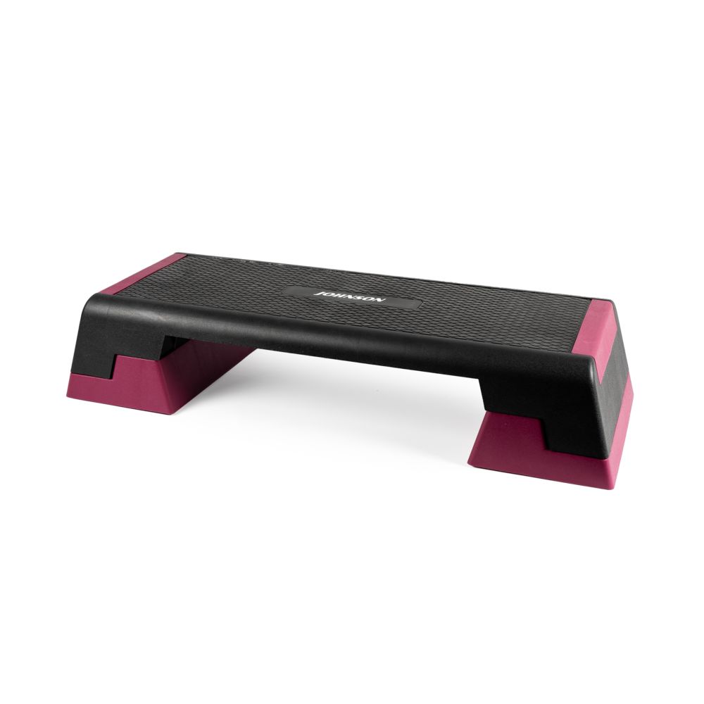 Aerobic stepper. Zwart en roze. Gekarteld oppervlak. Merk JOHNSON.