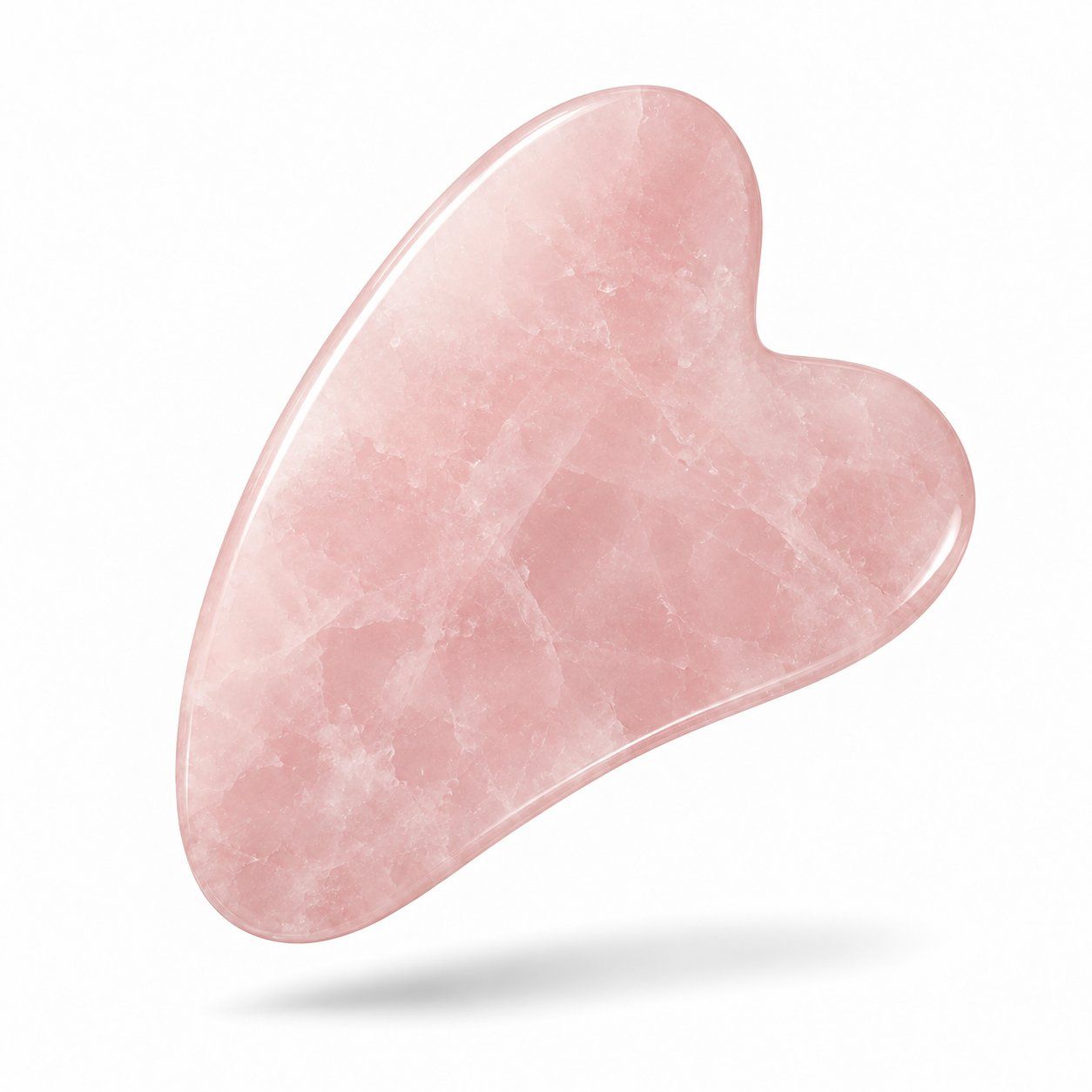 Roze hartvormige Gua Sha steen met gepolijst oppervlak en afgeronde randen.