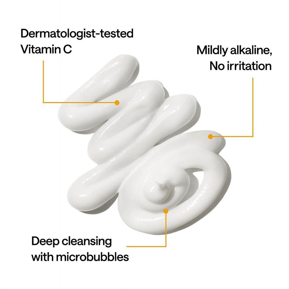 Wit product met tekst. Opschrift: Dermatologisch getest, Vitamine C, Diepe reiniging, Geen irritatie. Gele tekstvakken.