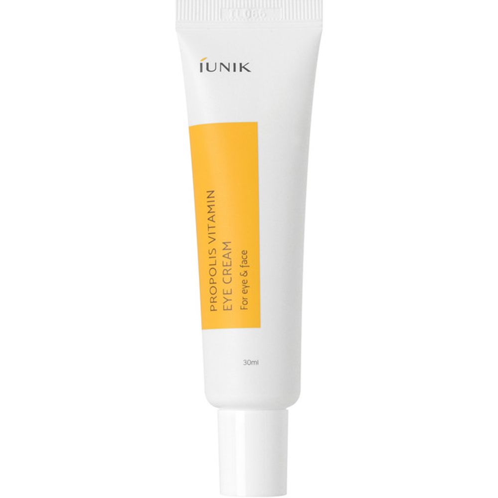 Tube blanc avec étiquette jaune. Inscription: PROPOLIS VITAMIN EYE CREAM, iUNIK. Pour les yeux et le visage. 30ml.