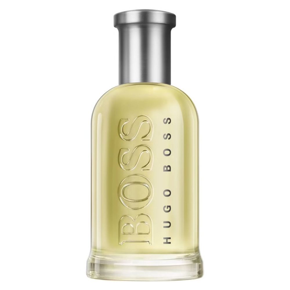 Flacon Boss Bottled Eau de Toilette. Flacon en verre avec bouchon argenté. Logo et nom du produit visibles.