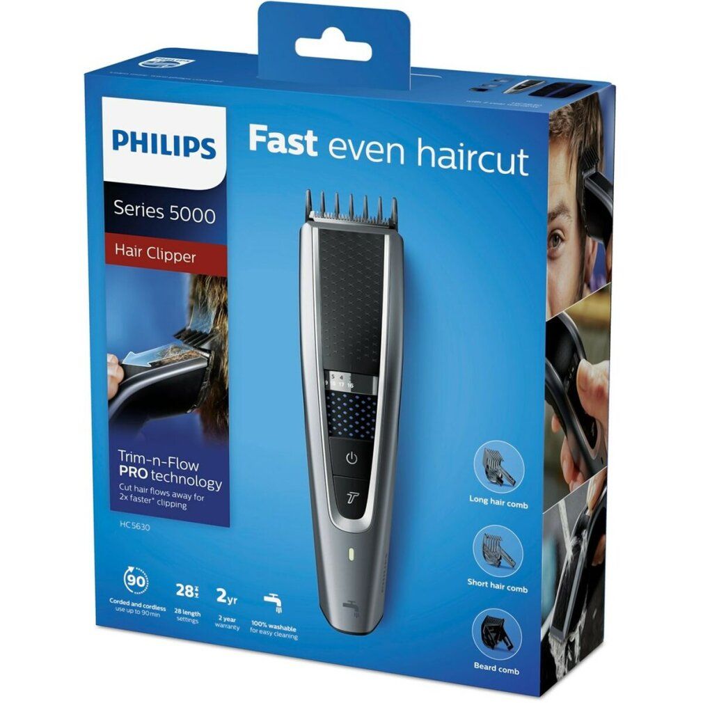 Tondeuse Philips sur emballage. Appareil noir et argent. "Fast even haircut" et "Trim-n-Flow PRO technology" sont visibles.