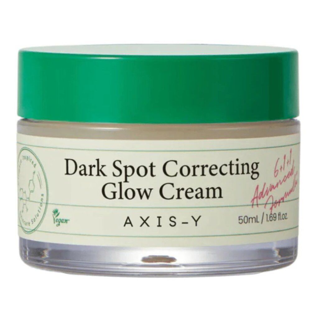 Pot de crème avec couvercle vert. Contient la crème 'Dark Spot Correcting Glow Cream' d'AXIS-Y.