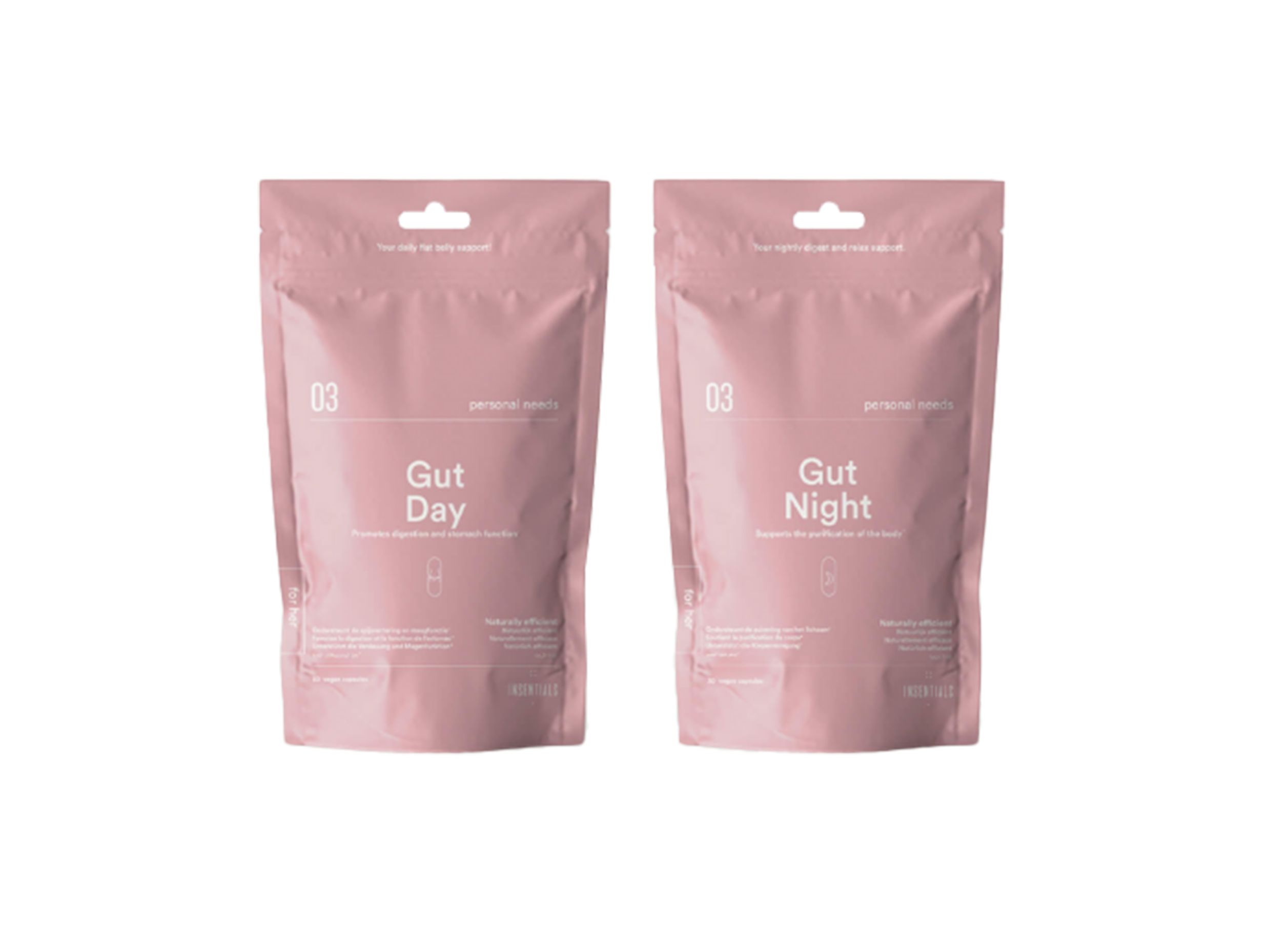 Twee roze zakjes met 'Gut Day' en 'Gut Night'. Beide hebben een ophanggat en witte letters.