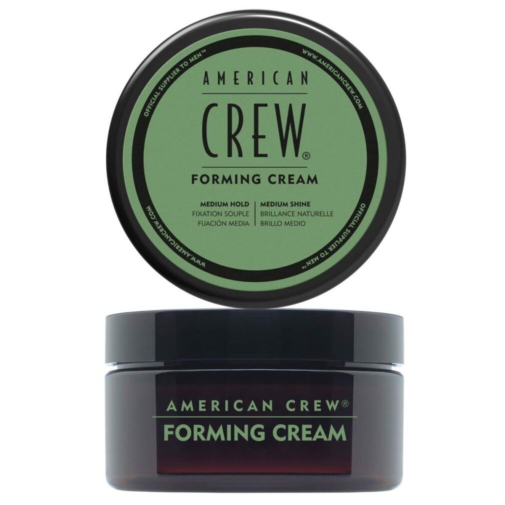 Pot brun foncé avec couvercle vert. Inscription: AMERICAN CREW FORMING CREAM. Texte sur le couvercle.