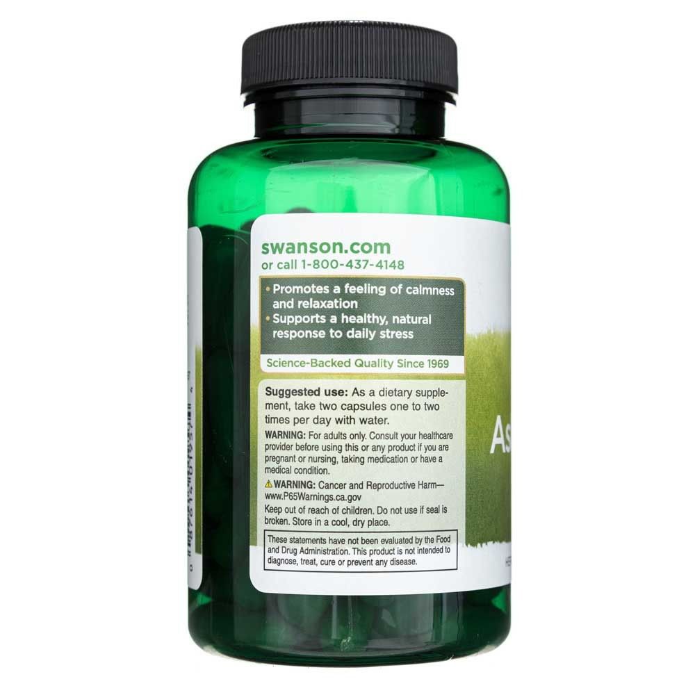 Arrière d'une bouteille verte de capsules d'Ashwagandha, montrant les instructions d'utilisation et les avertissements.