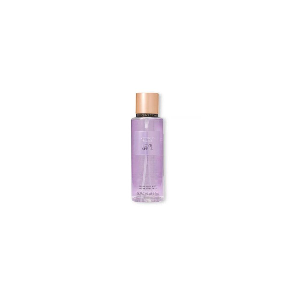 Brume corporelle Victoria's Secret Love Spell dans une bouteille transparente avec bouchon doré.