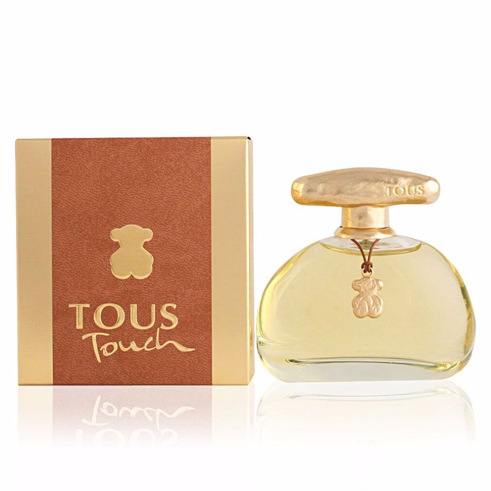 Flacon de parfum et emballage. Flacon rond, bouchon doré. Emballage marron avec logo et texte.
