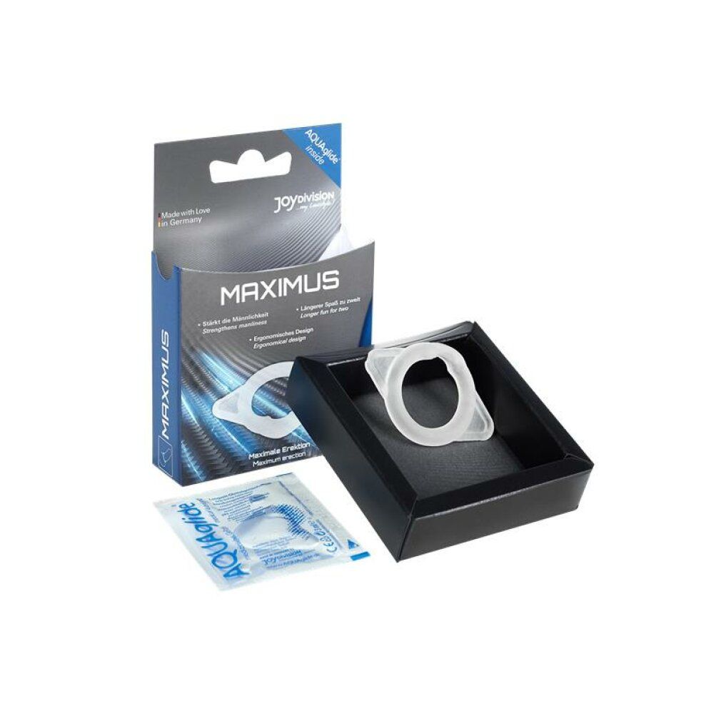 MAXIMUS productpresentatie. Witte penisring, AquaGlide zakje, zwarte doos. Opschrift MAXIMUS. Ergonomisch ontwerp.