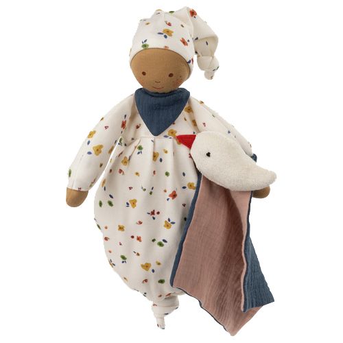 Poupée en tissu avec bonnet de nuit à fleurs. Elle tient un doudou blanc avec un tissu rose et bleu.
