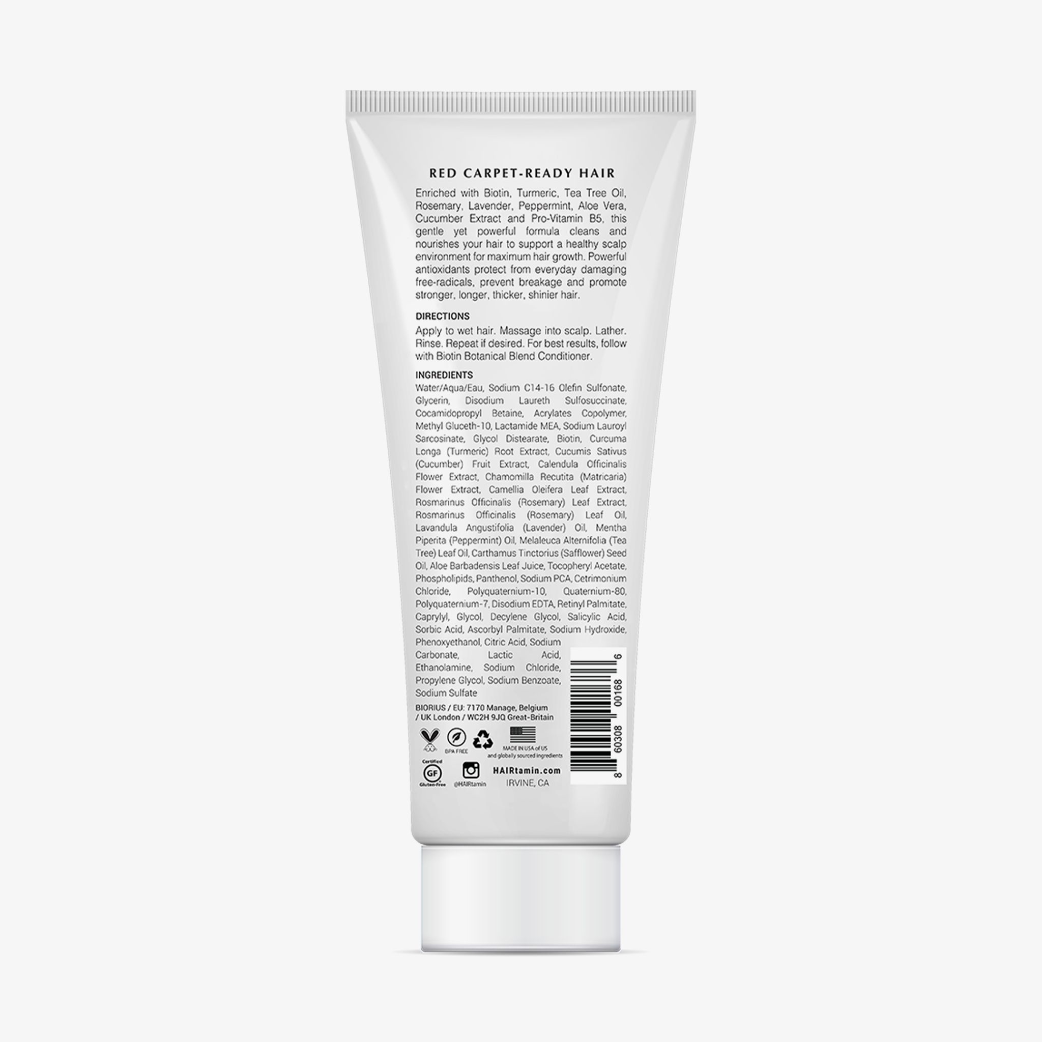 Dos d'un tube blanc. Texte : "RED CARPET-READY HAIR". Ingrédients et instructions. Logos : Vegan, Cruelty-Free, B Corp.