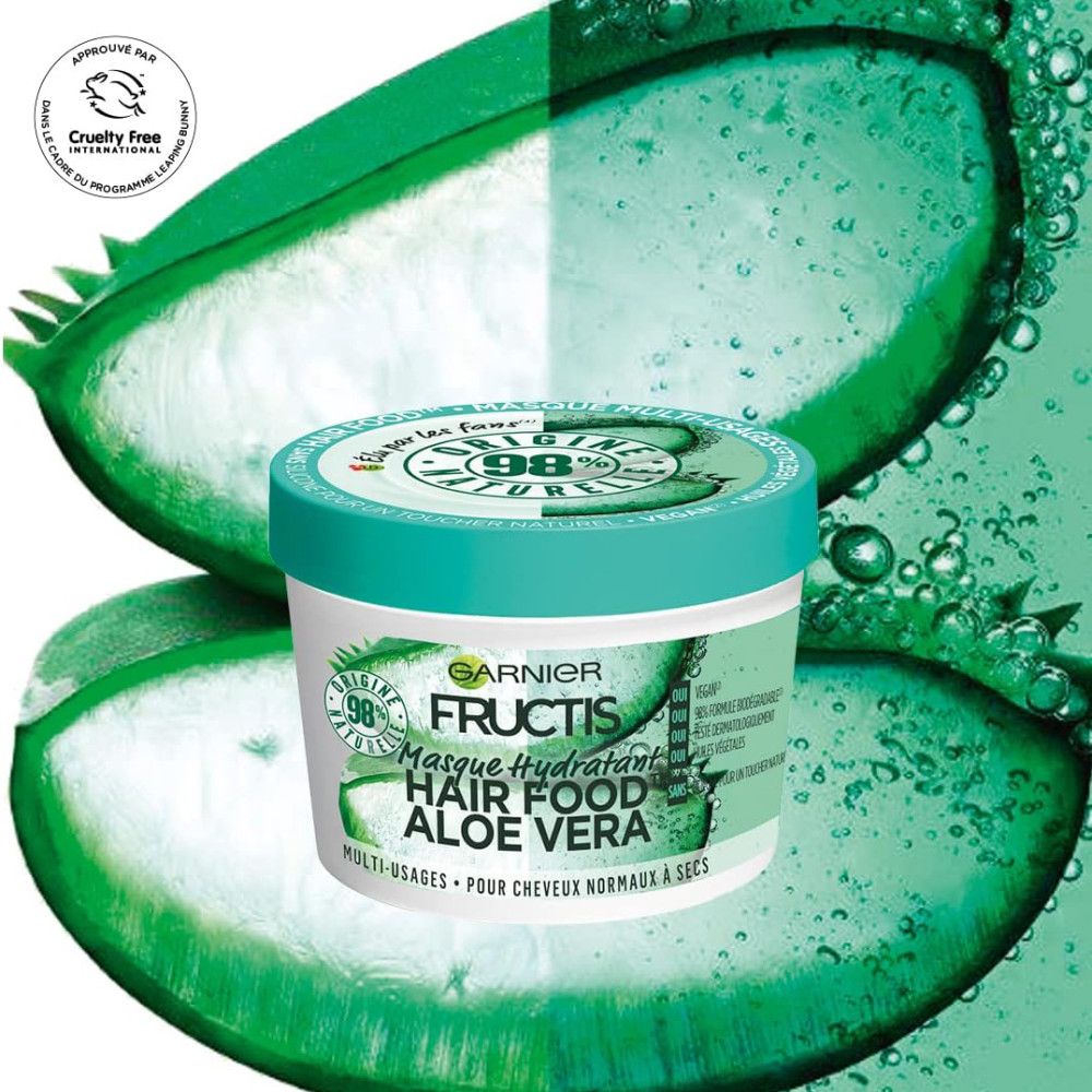Masque capillaire à l'aloe vera. Pot rond à couvercle vert. Texte: Garnier Fructis Hair Food. 98% ingrédients naturels. Cruelty Free.