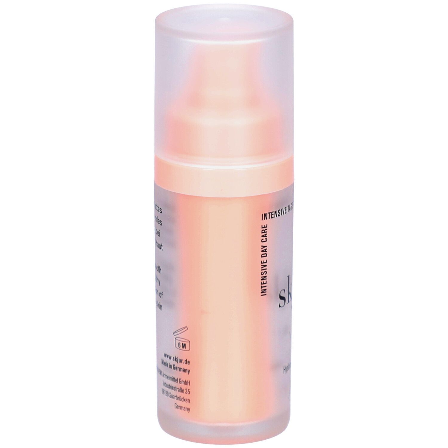 Crèmedispenser met transparante dop. Opschrift: skjur. Opdruk: Intensieve dagverzorging. Achterkant met tekst en logo.